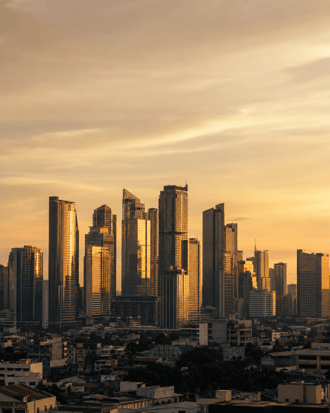 Manila skyline at golden hour, representing Estluxe's nationwide expertise
